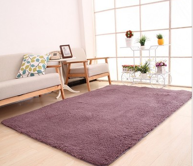 Fluffy beige shag rug in living room