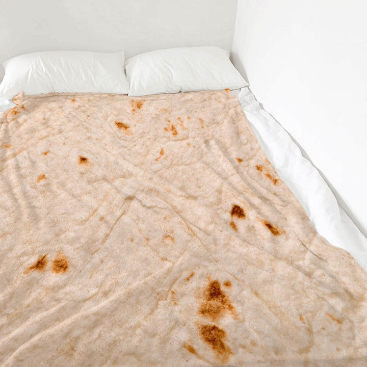 Person wrapped in a tortilla blanket