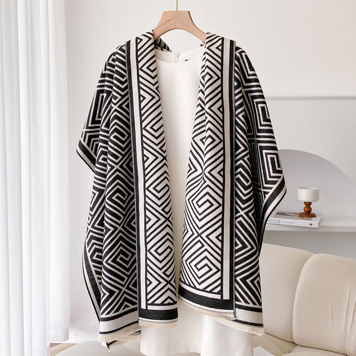 Woman wearing fringe shawl cape