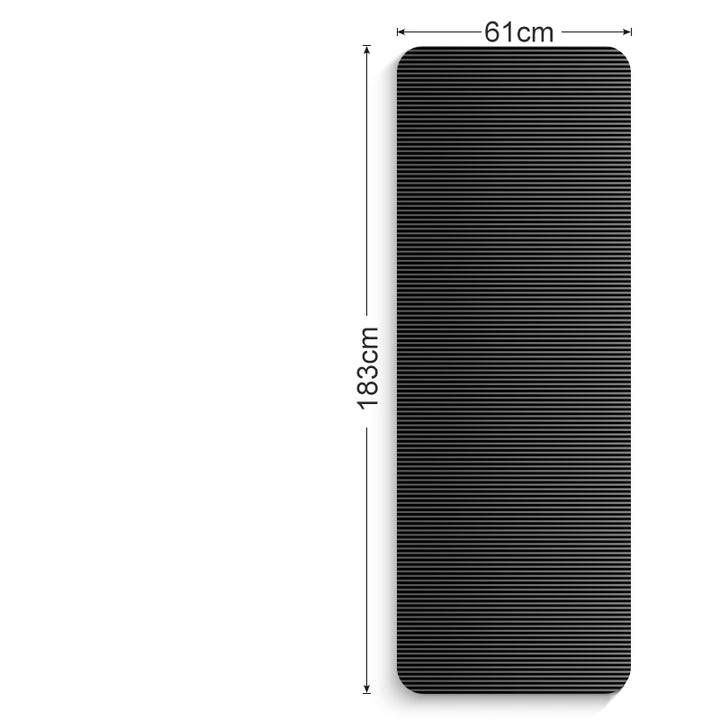 Rolled black yoga mat with carry strap