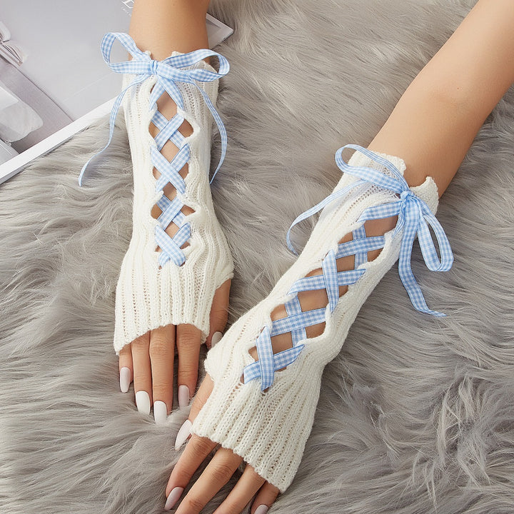 White arm warmers with lace-up ribbon