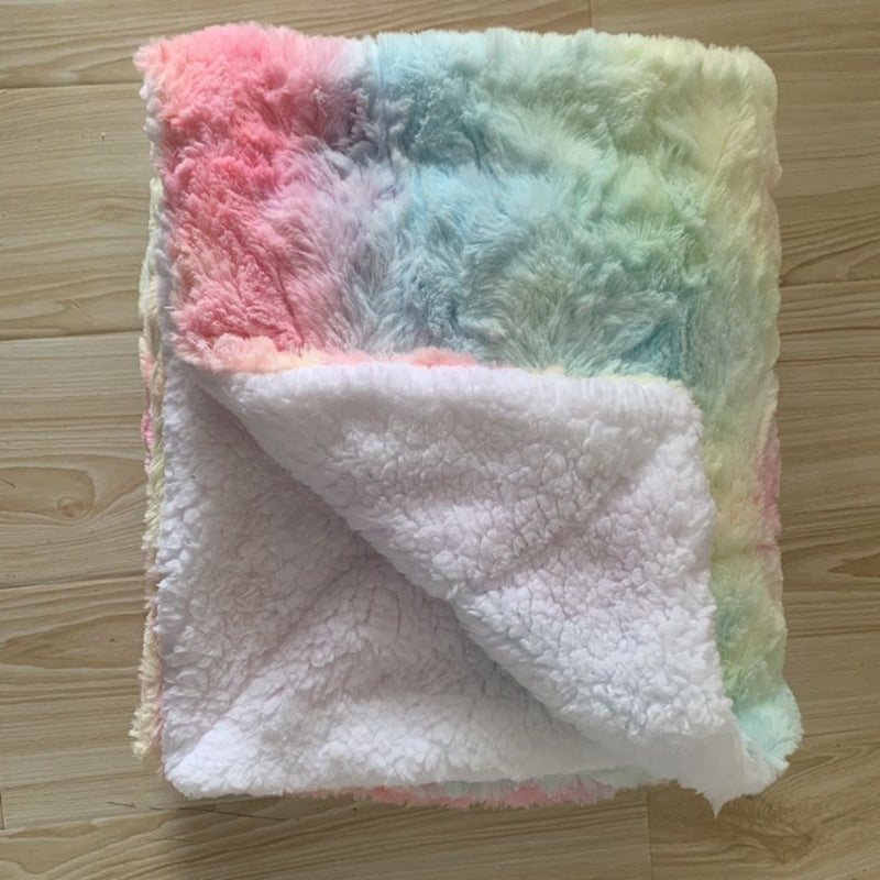 Thick sherpa fleece throw on a sofa