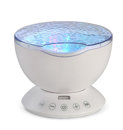 Ocean wave projector lighting a bedroom