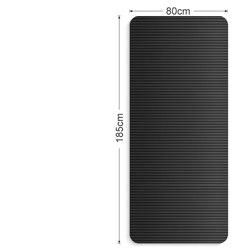 Rolled black yoga mat with carry strap