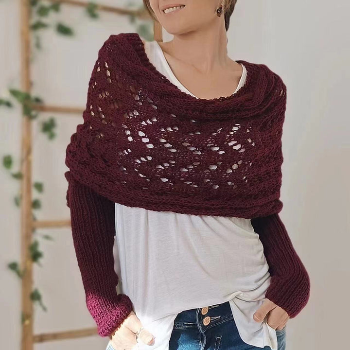 Woman wearing a knit shawl with sleeves