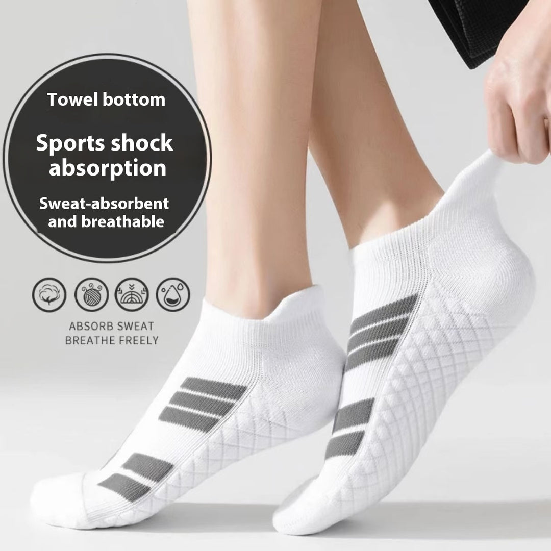 Stack of white low-cut cotton ankle socks