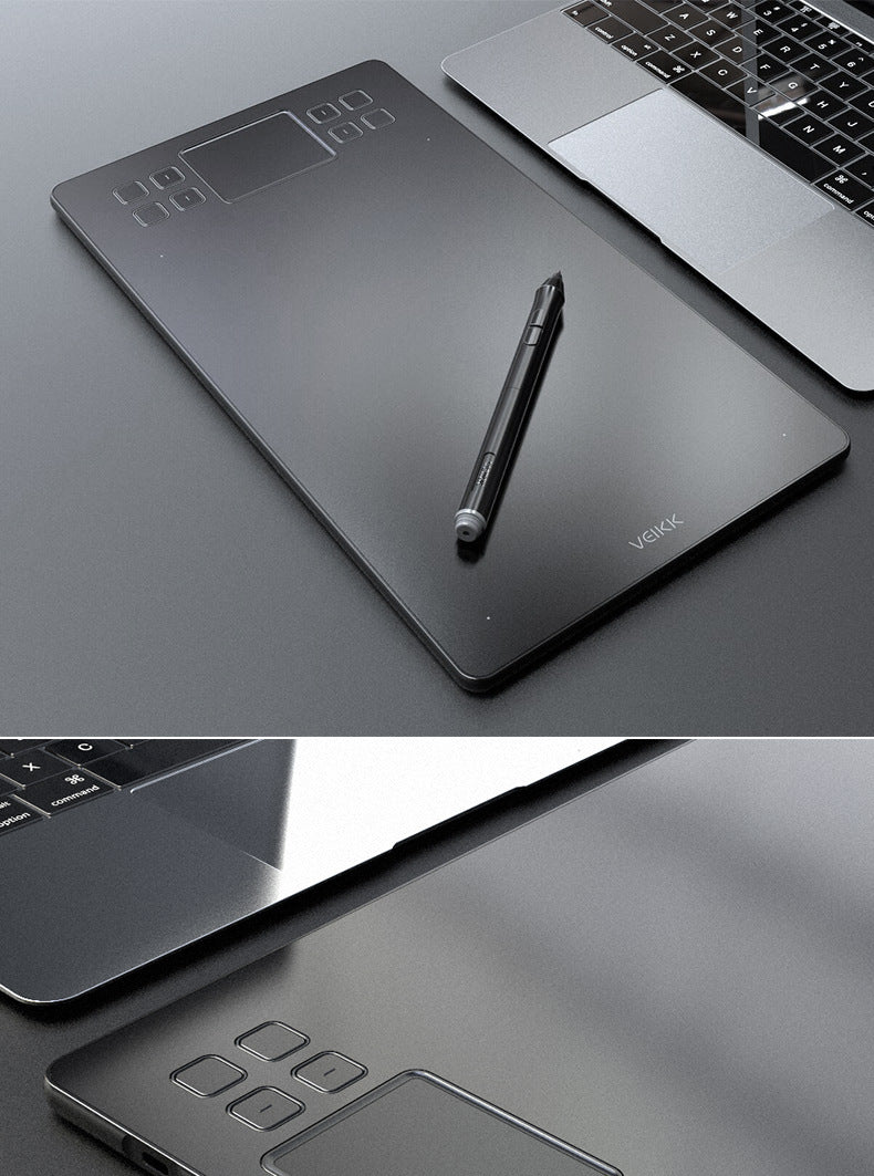 Black graphics drawing tablet with pen