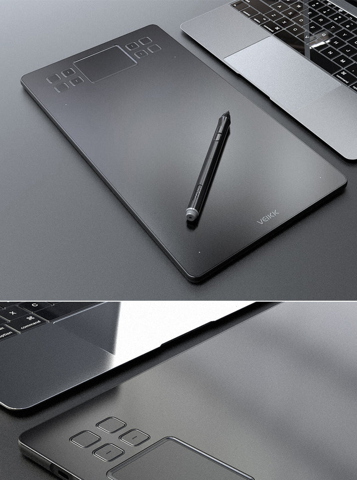 Black graphics drawing tablet with pen