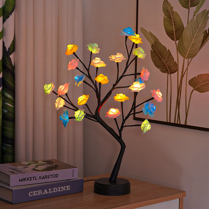 Glowing rose tree lamp on a table