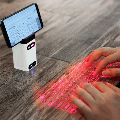 Laser projection keyboard on a table