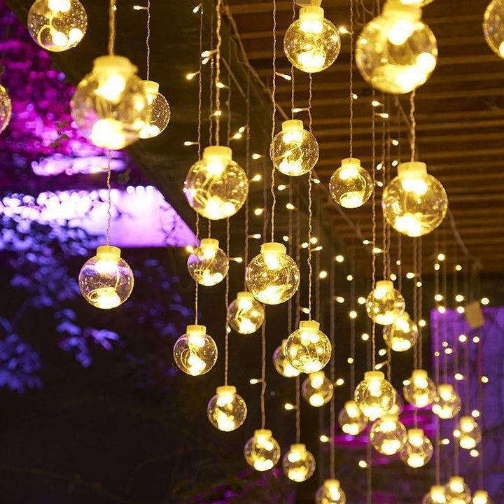 LED globe curtain lights in window