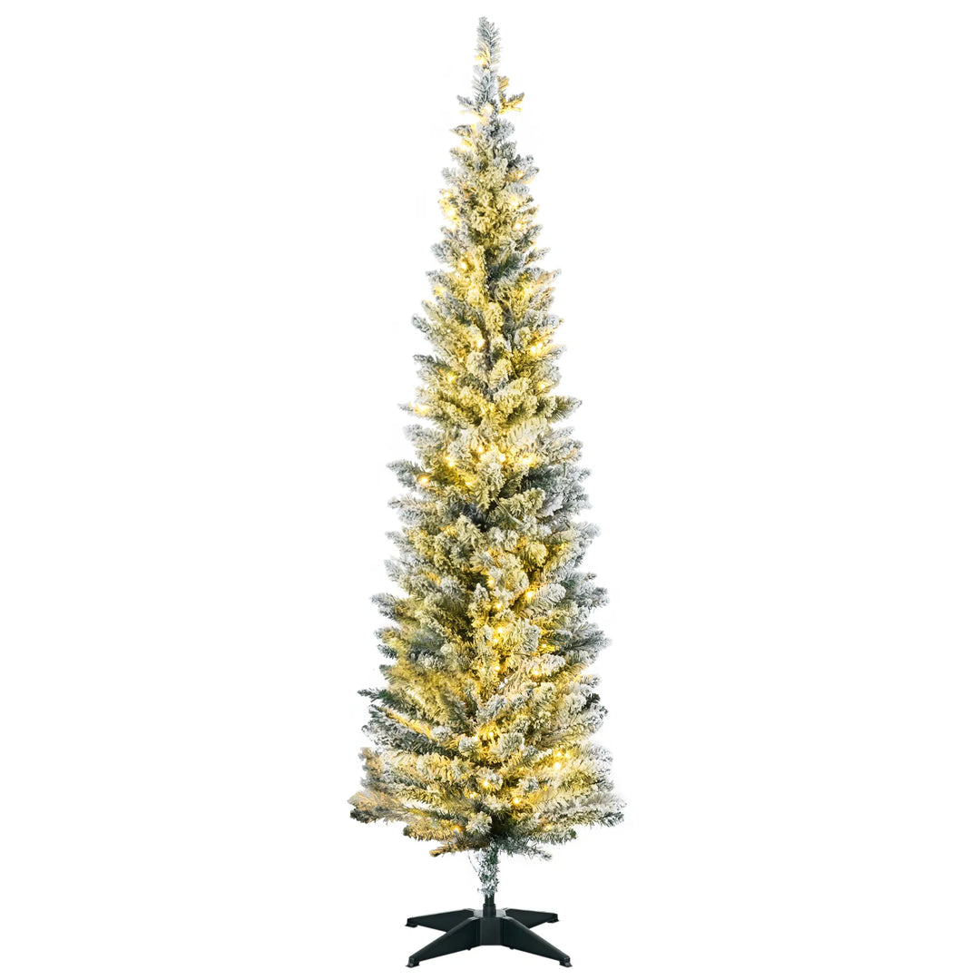 Pre-lit snow flocked pencil tree glowing warm