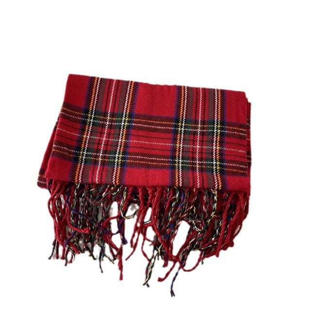 Woman wearing a red tartan scarf