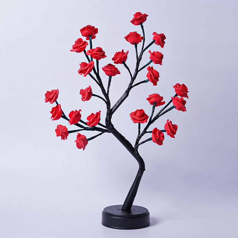 Glowing rose tree lamp on a table