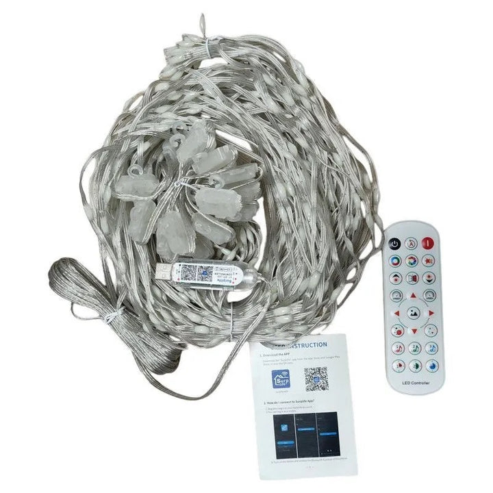 Smart LED curtain light showing a Christmas pattern
