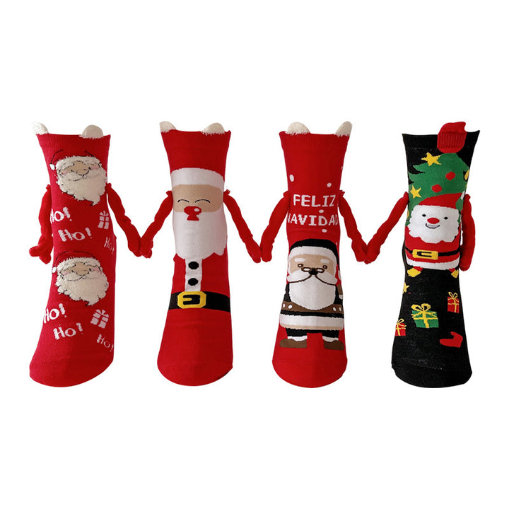 Couple wearing magnetic Christmas socks