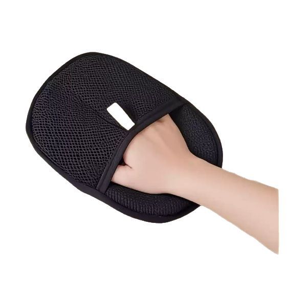 Pet hair remover glove on dog