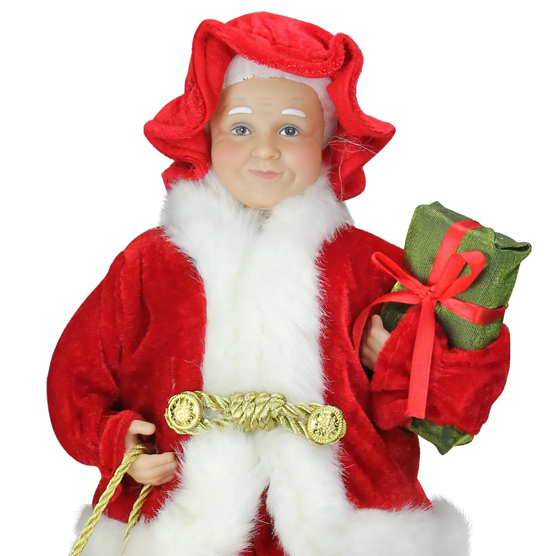 Mrs Claus figure with gift bag