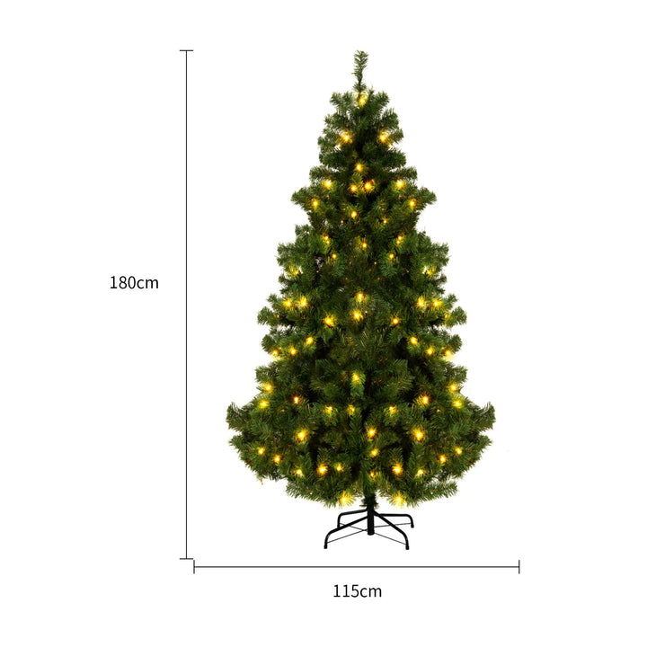 Snow-flocked white Christmas tree with warm-white lights