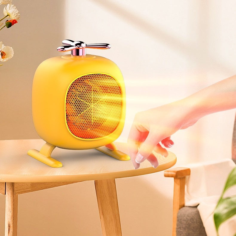 Yellow helicopter shaped mini desk heater
