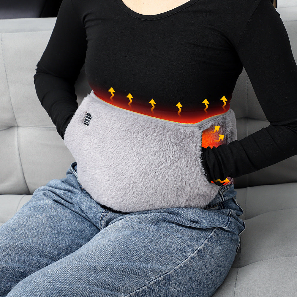 Plush heated waist belt with hand pocket