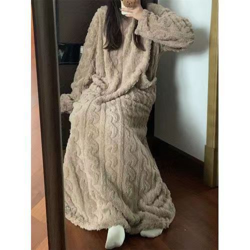 Woman in a long pink fleece nightgown