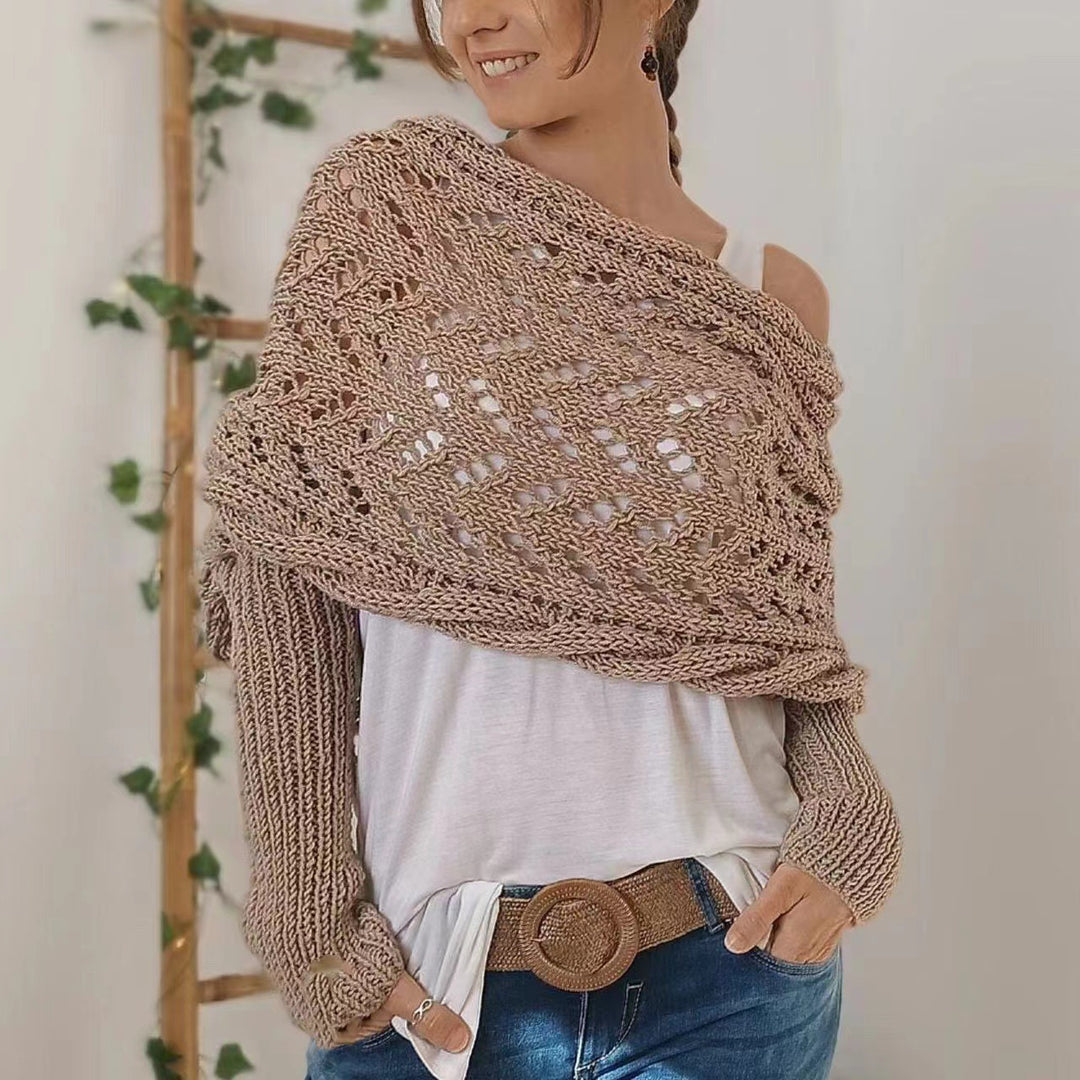 Woman wearing a knit shawl with sleeves