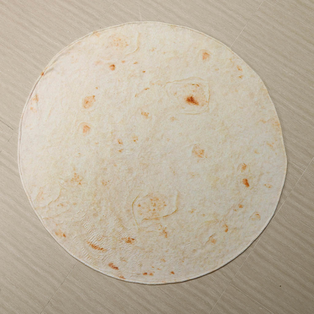 Person wrapped in a tortilla blanket