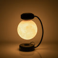 Floating moon lamp under arched holder