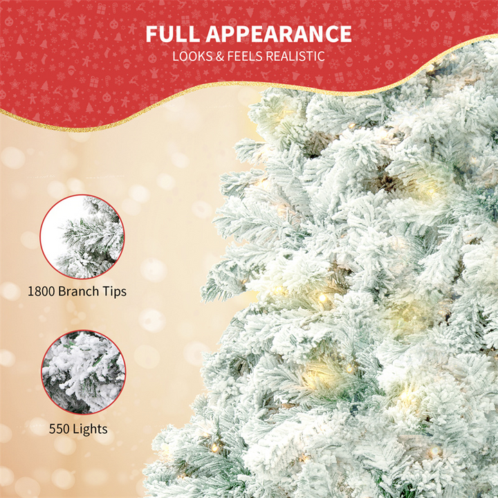 Snow-flocked white Christmas tree with warm-white lights
