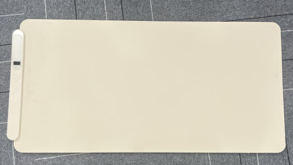 Graphene food warming mat on dining table