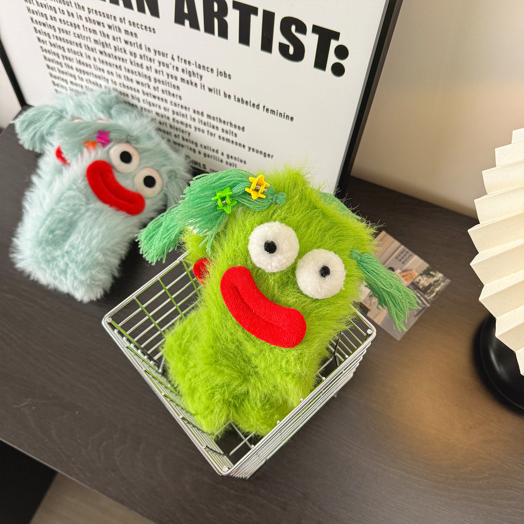 Fluffy green plush socks with googly-eyed monster faces