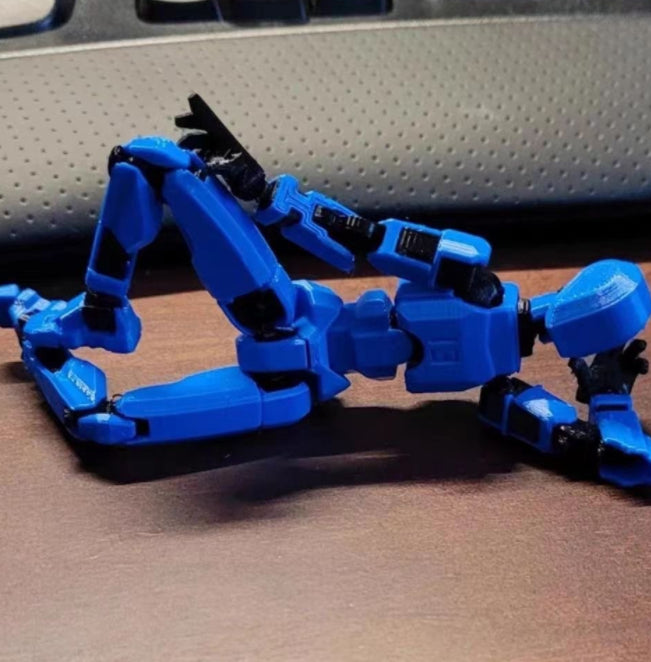 Orange poseable 3D printed robot figure