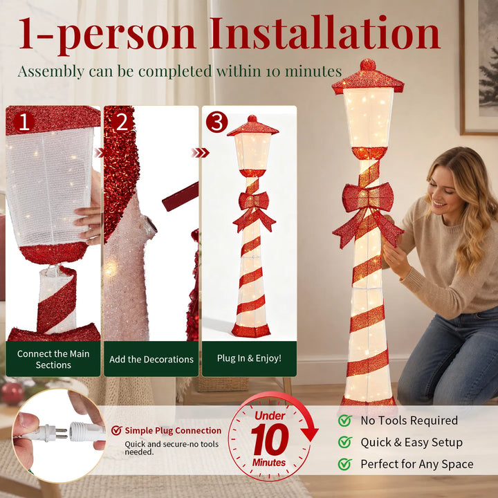 Lighted candy cane striped Christmas lamp post on a porch