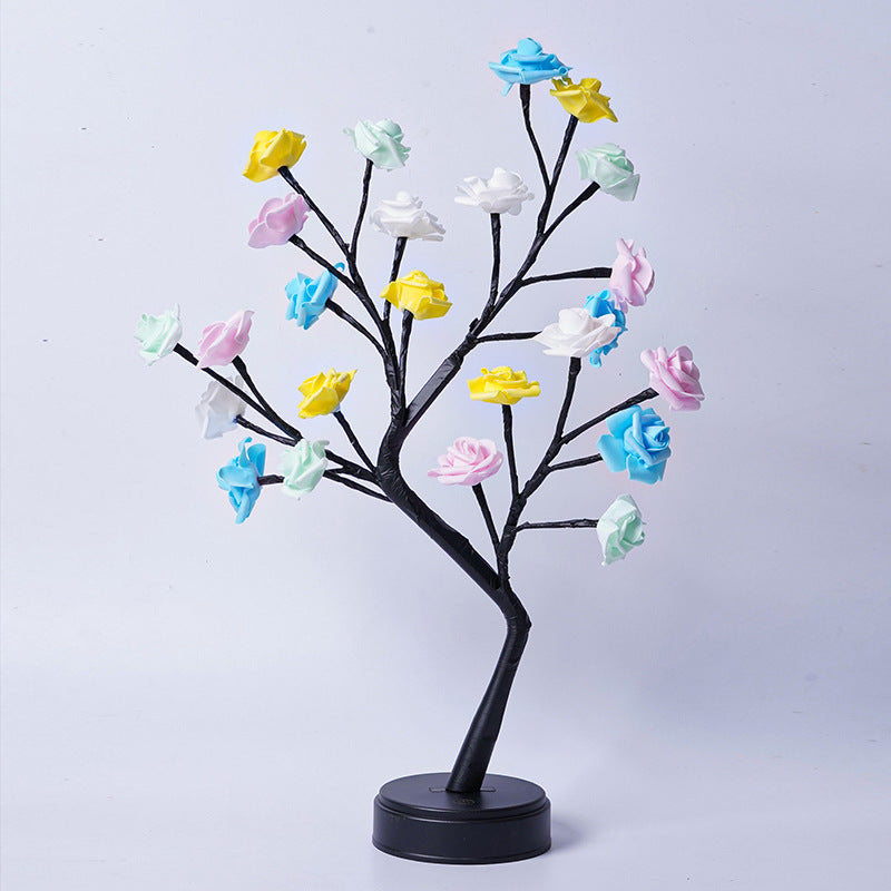 Glowing rose tree lamp on a table