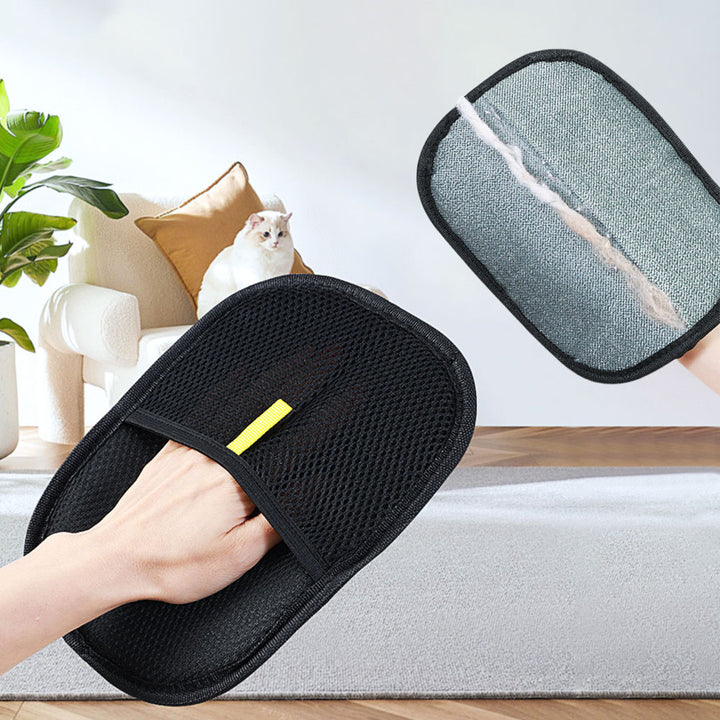 Pet hair remover glove on dog