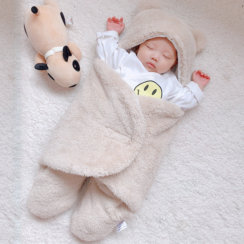 Baby in a bear ear sleep sack