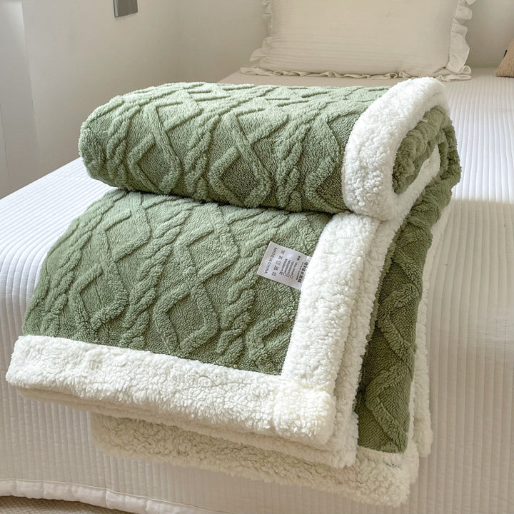 Cable-knit jacquard blanket with sherpa border
