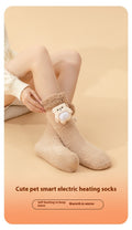 Plush heated socks with a pink deer badge