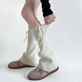 Flared ribbed leg warmers with tie