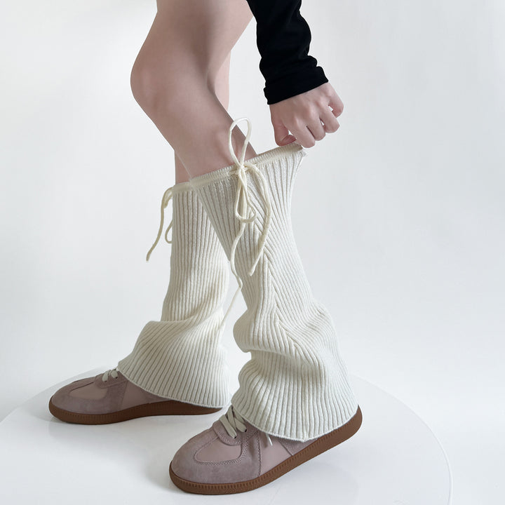 Flared ribbed leg warmers with tie