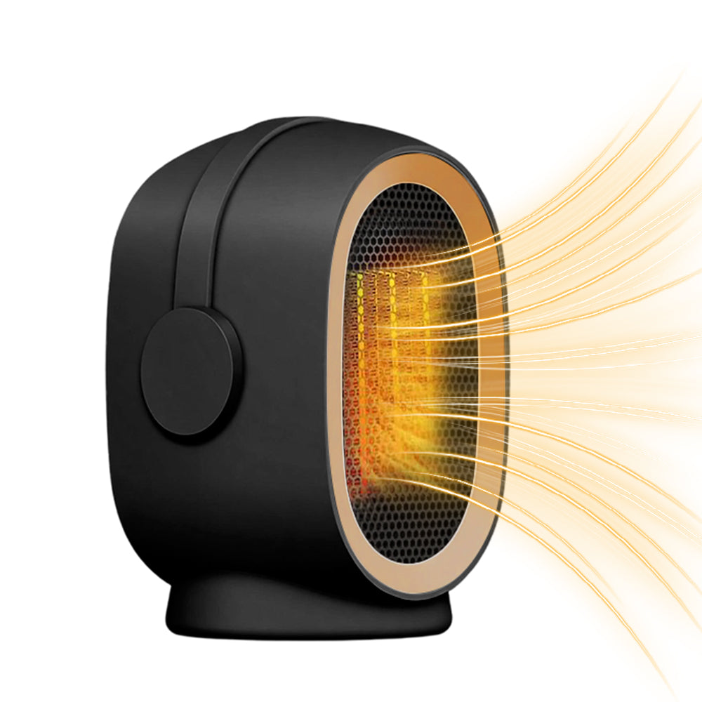 Compact ceramic space heater on desk
