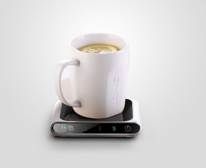 White smart mug warmer with coffee mug