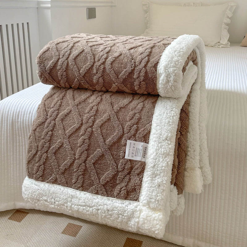 Cable-knit jacquard blanket with sherpa border