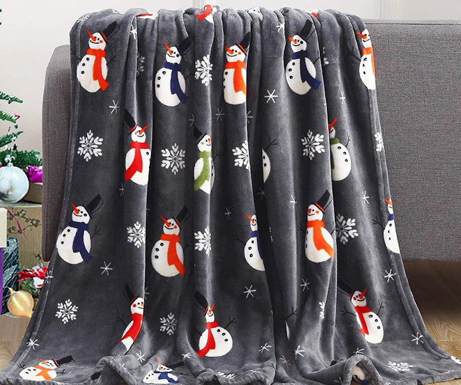 Christmas flannel throw on a sofa