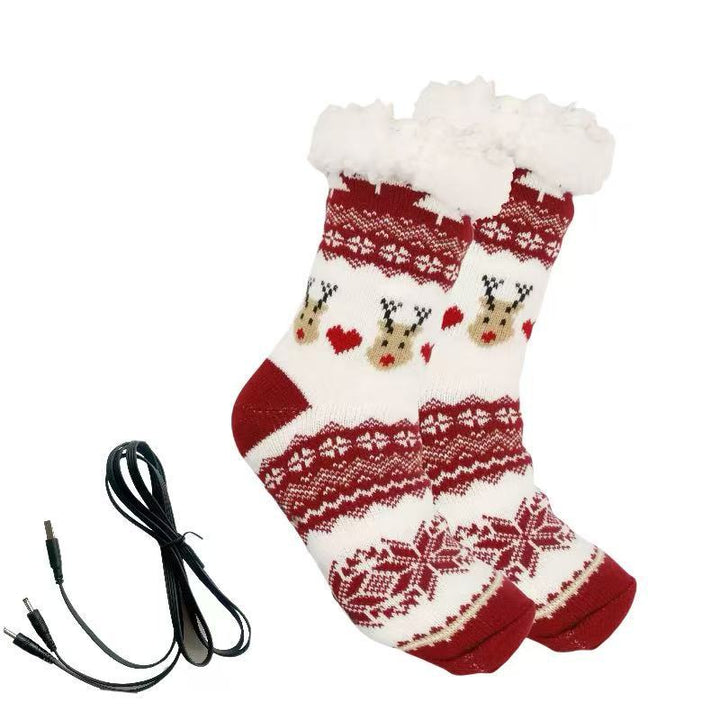 Red knitted Christmas socks with Santa pattern