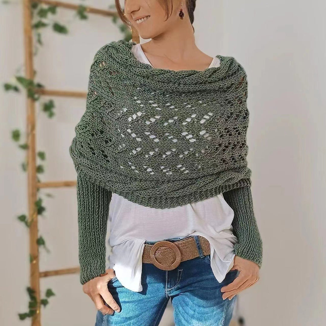 Woman wearing a knit shawl with sleeves