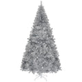 Full silver artificial Christmas tree on a metal stand