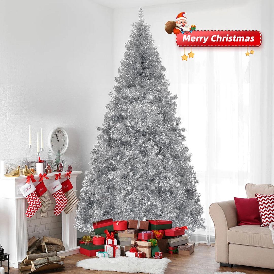 Full silver artificial Christmas tree on a metal stand