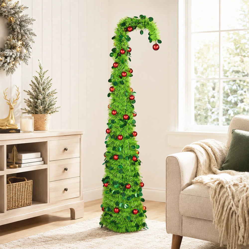 Green pop up Christmas tree with red ornaments